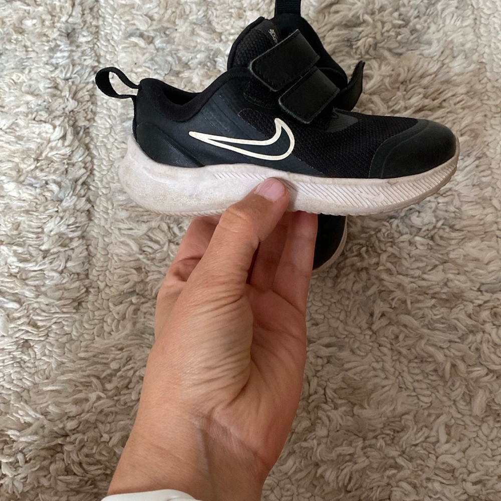 Nike Black Sneakers with Velcro Straps and Minimalist Design